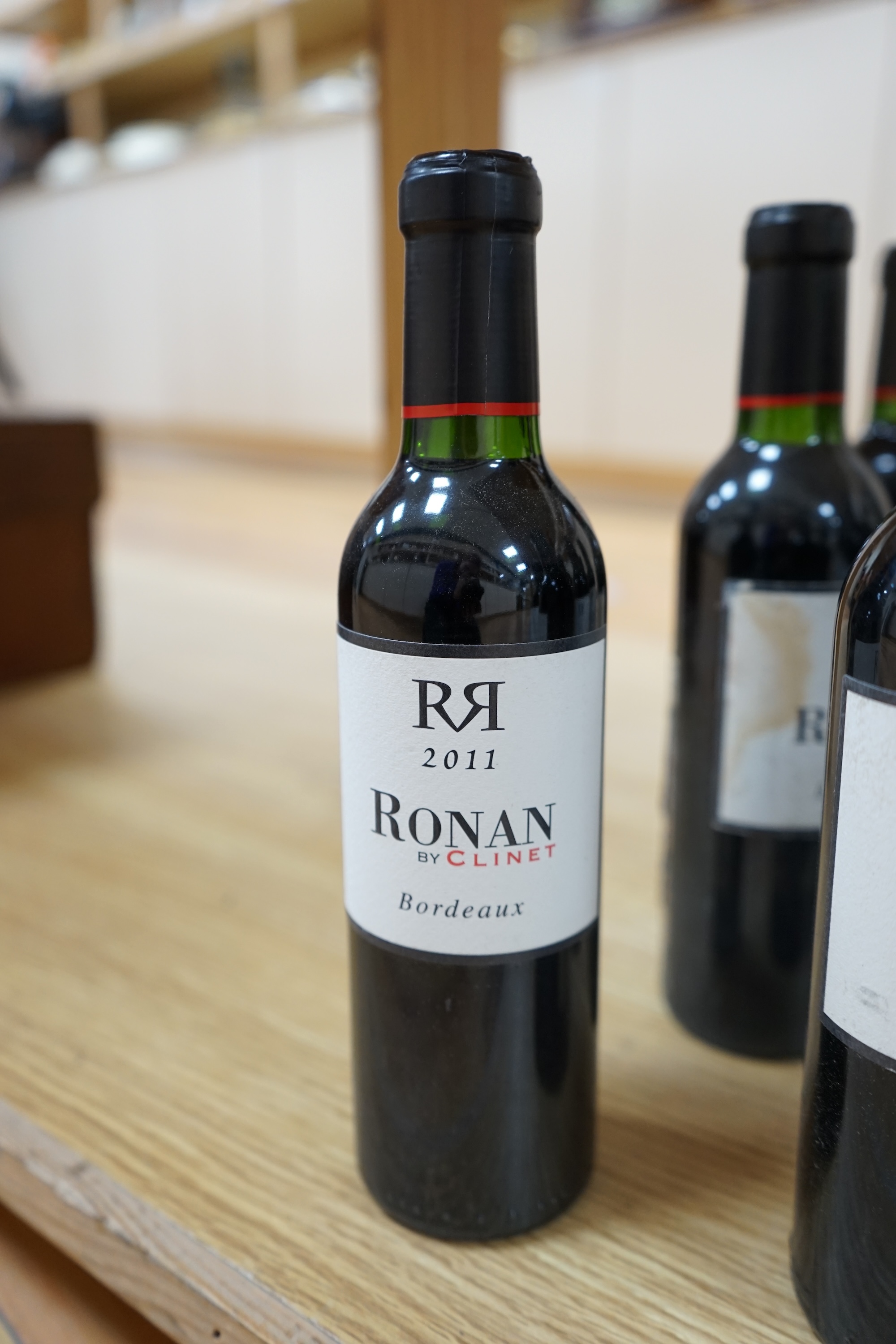 Twenty seven bottles (24 35cl and 3 75cl) of 2011 Ronan by Clinet Bordeaux wine. Condition - storage unknown